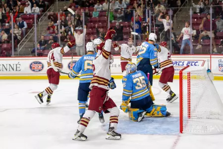 Mike Posma celebrates a Drew Fortescue