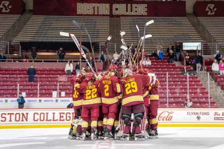 Women's Hockey Team Huddle After OT win vs UConn