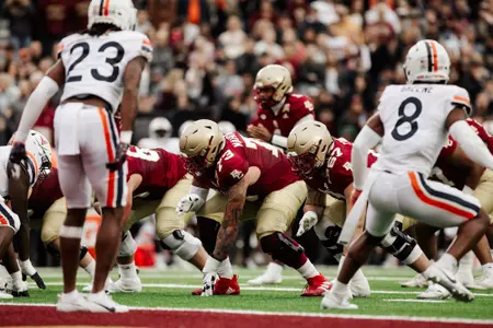 Christian Mahogany takes a snap at left guard as BC approaches the goal line against Virginia.