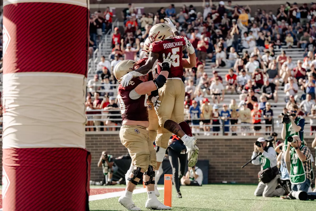 Kye Robichaux celebrates with teammates after BC touchdown