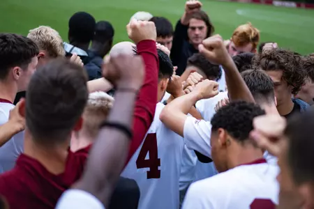 Men's soccer huddle