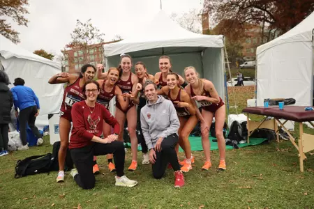 Women's Cross Country celebrating after regionals