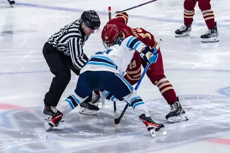 Cutter Gauthier faceoff at Maine