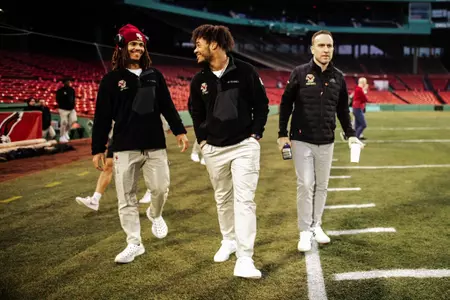 Bond, Castellanos and Hafley walk the field at Fenway