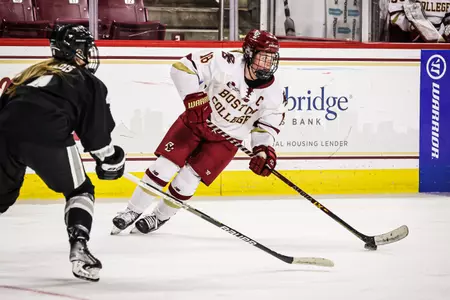 Kelly Browne carries the puck against Providence.
