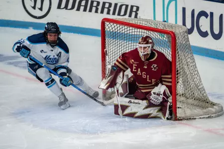Mitch Benson makes a save at Maine