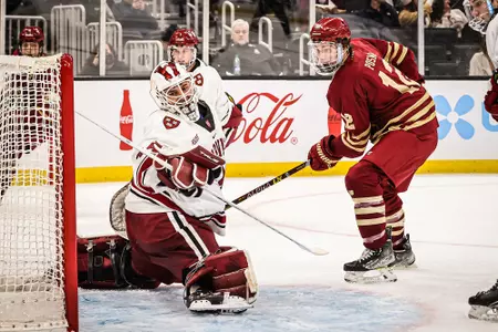 Mike Posma shoots on Harvard in the Beanpot