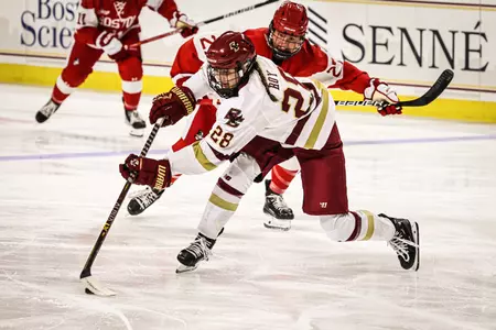 Gaby Roy handles the puck in the neutral zone against BU.