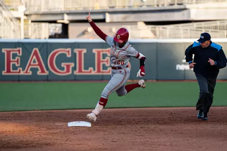 Meg Schouten rounds the bases after home run against Notre Dame
