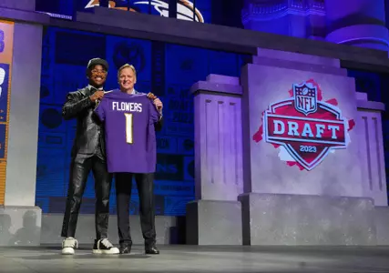 Zay Flowers and NFL Commissioner Roger Goodell at the 2023 NFL Draft