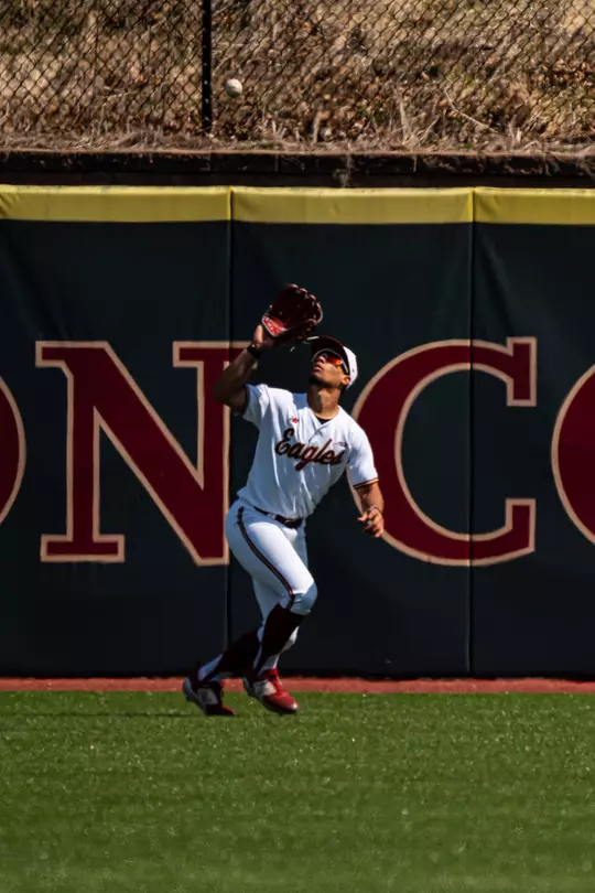 Cameron Leary catches a fly ball in left against Georgia Tech