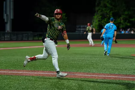 Nick Wang celebrates a home run against Villanova.
