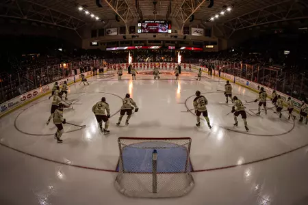 BC skates out for the anthem against BU