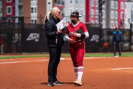 Head Coach Amy Kvilhaug and Abby Dunning during game against Louisville