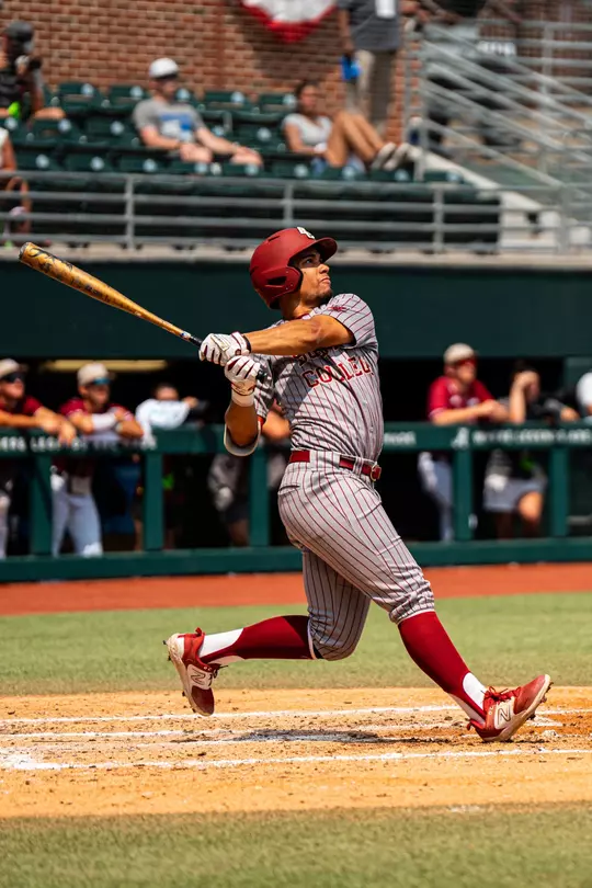 Cameron Leary lifts a fly ball against Troy.