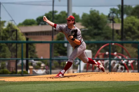 John West pitches vs. Troy.