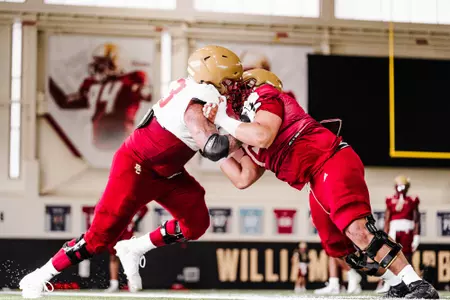 Christian Mahogany throws a block