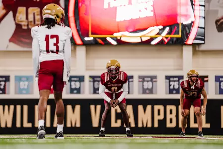 Alex Washington lines up across from Dino Tomlin
