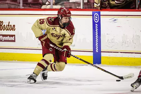 Gaby Roy skates up the wing against Harvard