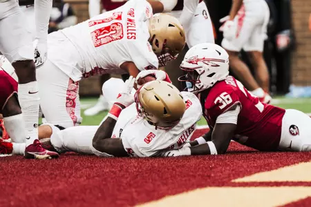 Kye Robichaux breaks through to score the first touchdown of the game