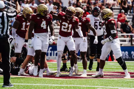 Victor Nelson hypes up Neto Okpala after defensive stop