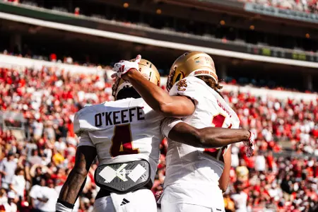 O'Keefe and Bond celebrate a BC touchdown at Louisville.