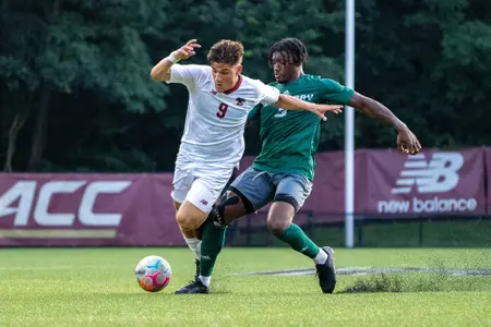 Drew Serafino dribbles against Green Bay