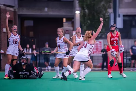 Margo Carlin celebrates goal for 100 career points