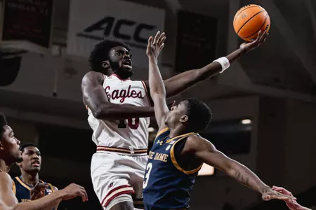 Boston College's Prince Aligbe drives to the basket vs. Notre Dame