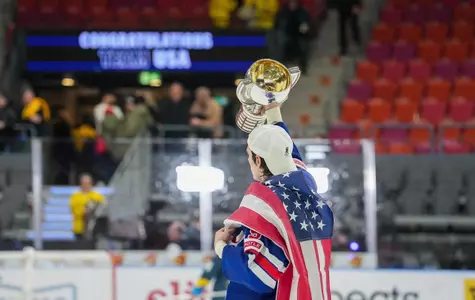Cutter Gauthier with World Juniors trophy