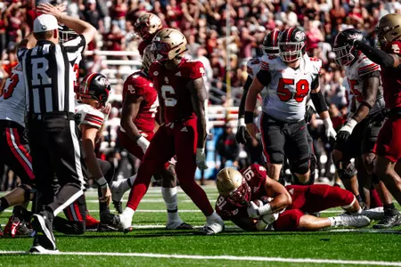 Donovan Ezeiruaku celebrates a strip-sack against Western Kentucky