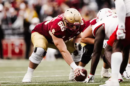 Drew Kendall ready to snap the ball against Louisville.