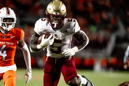 Kye Robichaux runs with the ball at Virginia Tech.