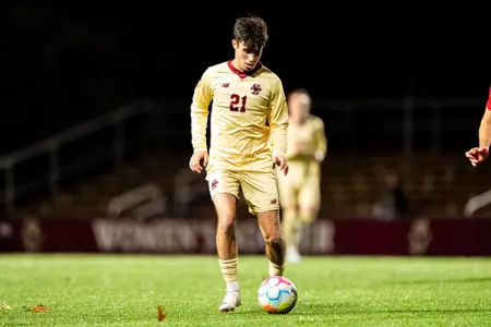 Marco Dos Santos dribbling the ball against Stony Brook