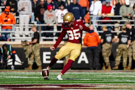 Liam Connor kicks off against Syracuse.