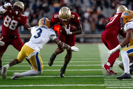 Kye Robichaux runs through a tackle against Pitt.