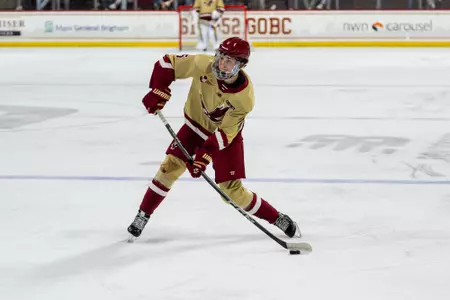 Drew Fortescue shooting the puck against Dartmouth