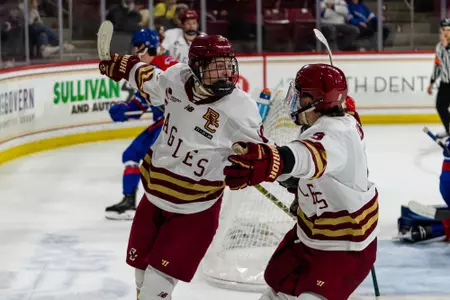 James Hagens and Ryan Leonard celebrating goal against UMass Lowell