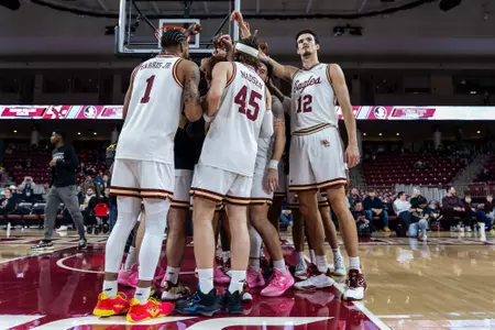 Boston College Men's Basketball huddles up before a game
