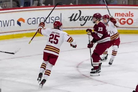 Jamie Armstrong raises his stick in celebration of a goal vs. UMass.
