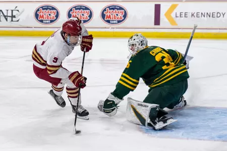 Ryan Leonard beats the UVM goalie.