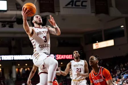 Jaeden Zackery drives to the basket against Syracuse