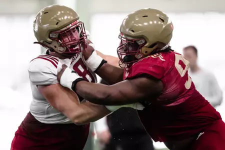 Ozzy Trapilo and Cam Horsley battle in the run-blocking drill.