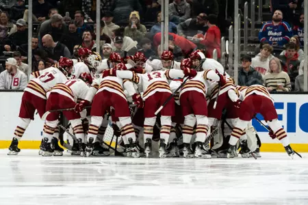BC players huddle before puck drop.