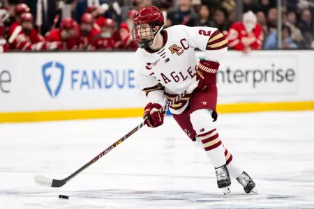 Eamon Powell skates with the puck vs. BU at TD Garden.