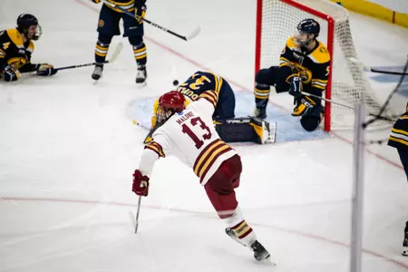 Jack Malone celebrates his game-winning, overtime goal vs. Quinnipiac.