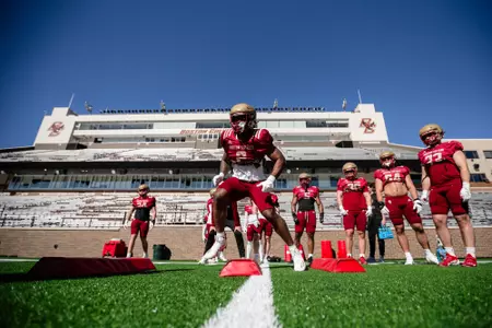 BC players go through warm-ups inside Alumni Stadium.
