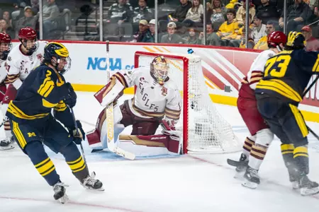 Jacob Fowler in net vs. Michigan