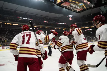 BC players celebrate a goal vs. Michigan.