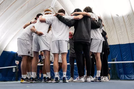 M Tennis Huddle